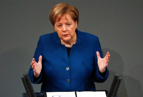 Merkel verteidigt UN-Migrationspakt