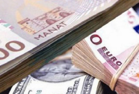 Manat verbilligte sich erneut zum Dollar und Euro