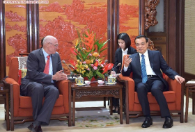 Li Keqiang trifft ehemaligen US-amerikanischen Finanzminister Henry Paulson in Beijing