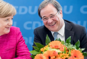 Merkel hofft auf Laschet, Söder auf Merz